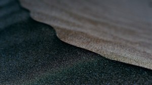 Oil seeping across sand.